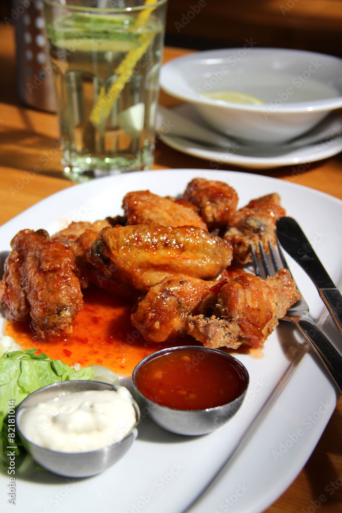 Bbq chicken wings with dips and salad Bbq chicken wings with dips and salad