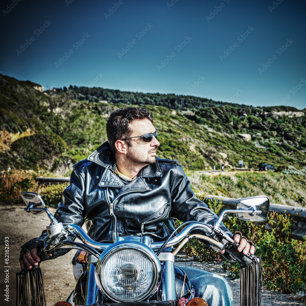 biker on a motorcycle in vintage tone