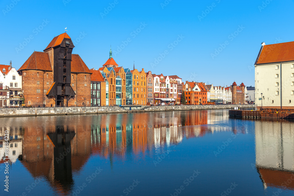 View of the riverside by the Motlawa river in Gdansk, Poland. View of the riverside by the Motlawa river in Gdansk, Poland.