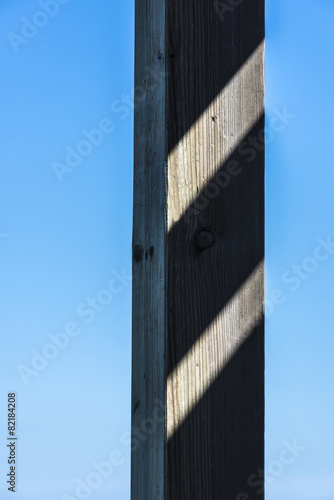 Canvas Print wooden column against the sky
