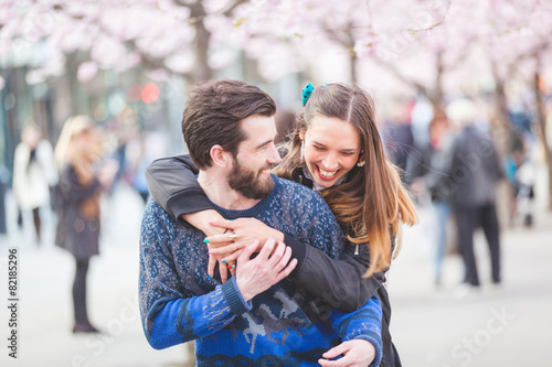 Photography Happy hipster couple in Stockholm with cherry blossoms