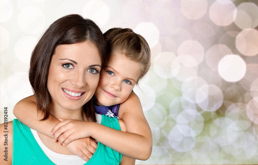 Mother. Family, child and happiness concept - hugging mother and Mother. Family, child and happiness concept - hugging mother and