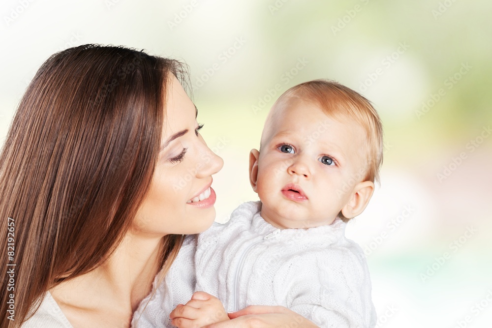 Mother. Happy cheerful family. Mother and baby kissing, laughing Mother. Happy cheerful family. Mother and baby kissing, laughing