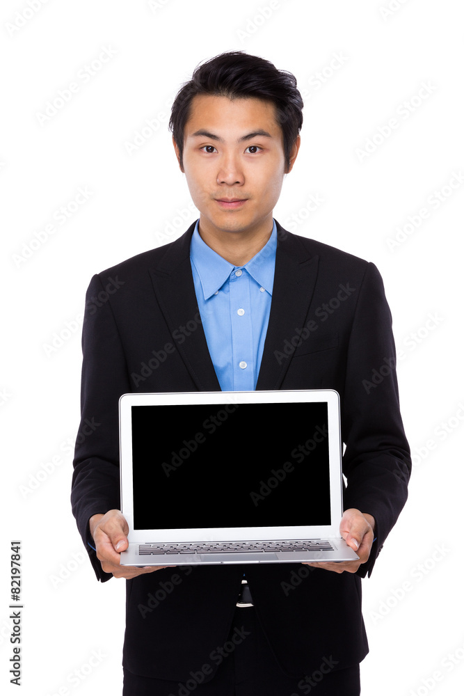 Businessman show with the blank computer screen Businessman show with the blank computer screen