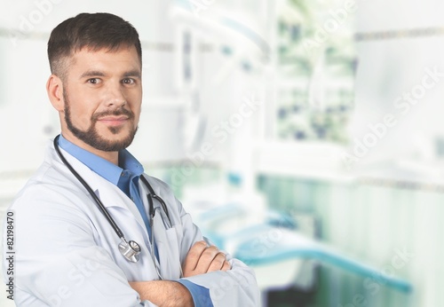 Background. Handsome doctor portrait