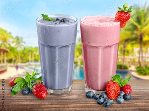 Fruit. Fresh Blueberry and Strawberry Smoothie on a background