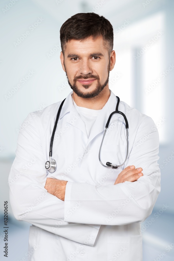 Doctor. Portrait of friendly male doctor smiling