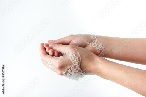 gesture of woman washing her hands on white background