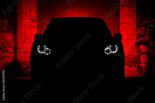 Schilderij op canvas Car Silhouette Headlight Night