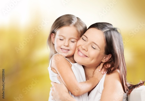 Mother. Family, child and happiness concept - hugging mother and