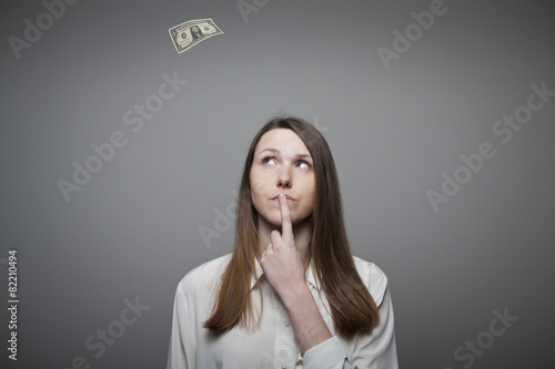 Girl in white and one dollar.