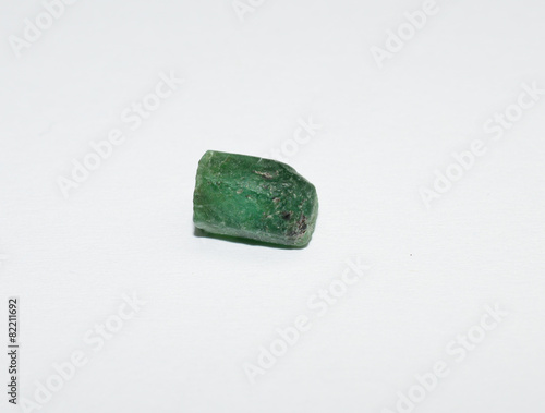 Fototapeta Naklejka Na Ścianę i Meble -  Emerald natural raw gemstone