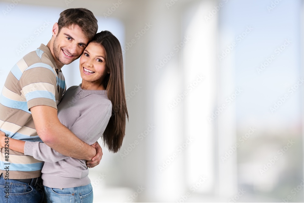 Summer. Beautiful affectionate couple smiling - isolated over a Summer. Beautiful affectionate couple smiling - isolated over a