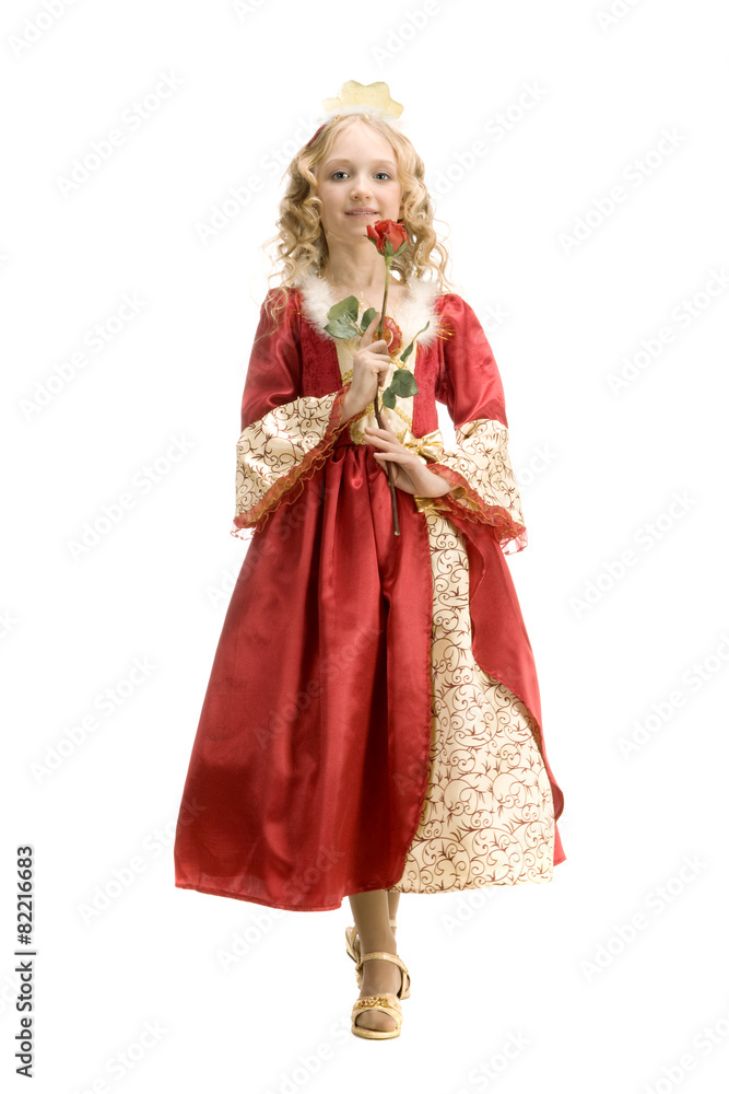 Beautiful little girl in princess costume standing with red rose