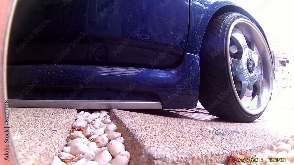 Sloping Rear Car Driving a lowered car on a sloping car park Stock-Video | Adobe Stock