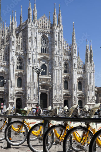 Ornate cathedral and bicycle parking, Milano, Lombardia, Italy photo