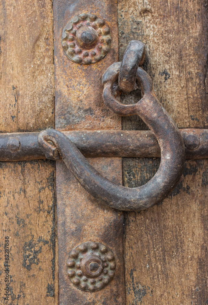 old and rusty steel hook on wood old and rusty steel hook on wood