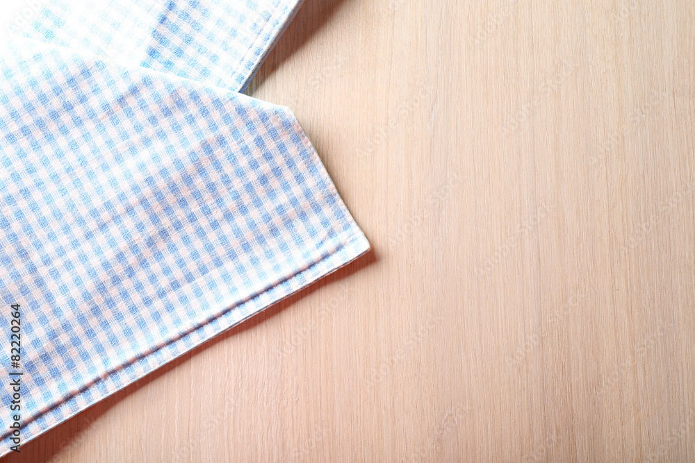 Napkin on wooden table Napkin on wooden table