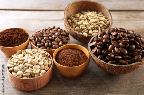 Various of coffee in small dishes on wooden background