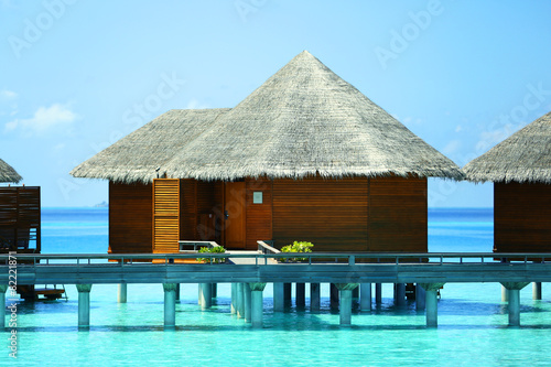 Fototapeta Naklejka Na Ścianę i Meble -  Water villas over blue ocean in Baros Maldives