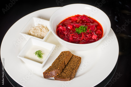 Borsch with creme fraiche, lard and bread 