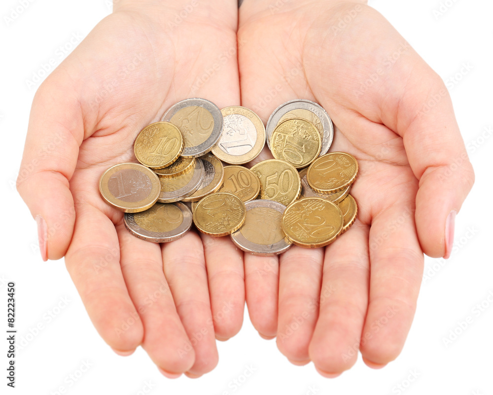 Female hands with coins isolated on white Female hands with coins isolated on white