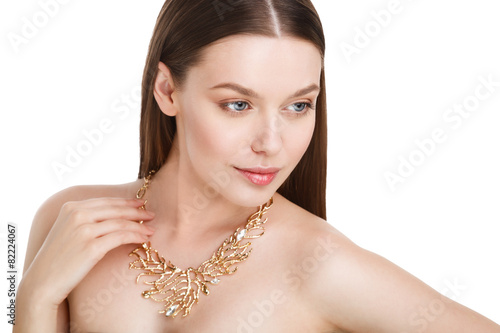 Young beautiful brunette woman with natural makeup isolated