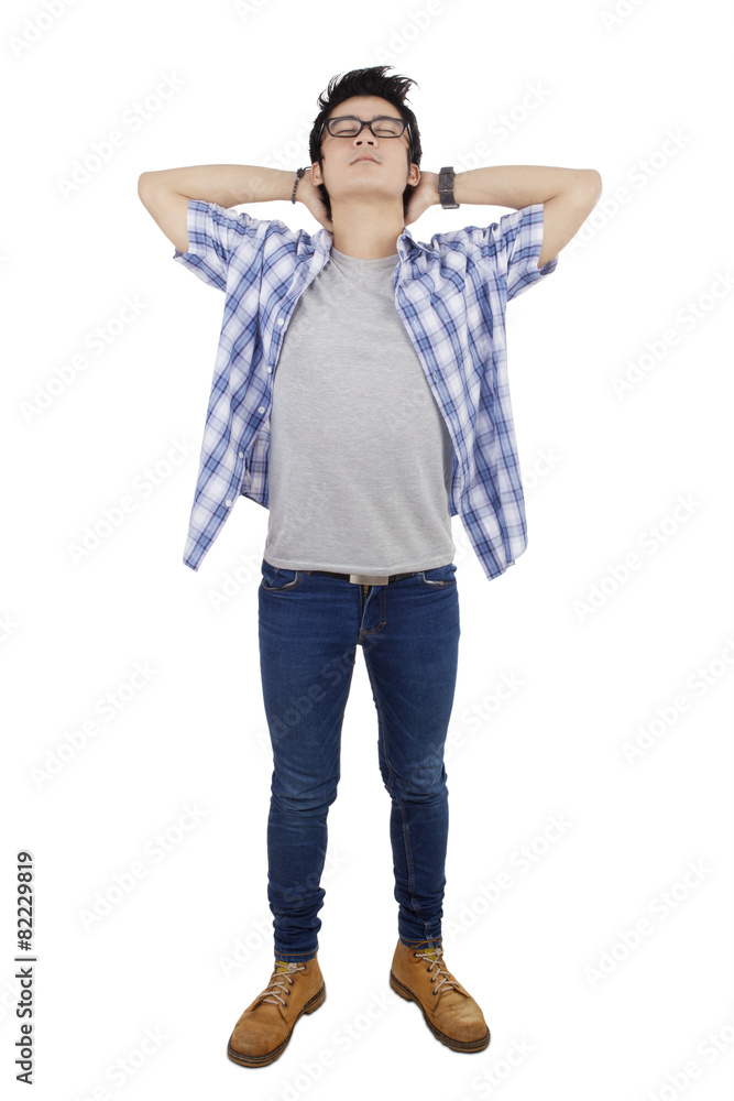 Full length of man relaxing in the studio Full length of man relaxing in the studio