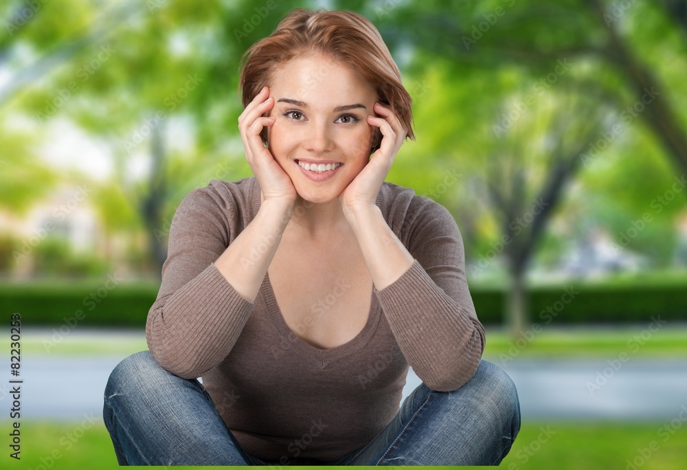 Women. Portrait of mature woman sitting in countryside Women. Portrait of mature woman sitting in countryside