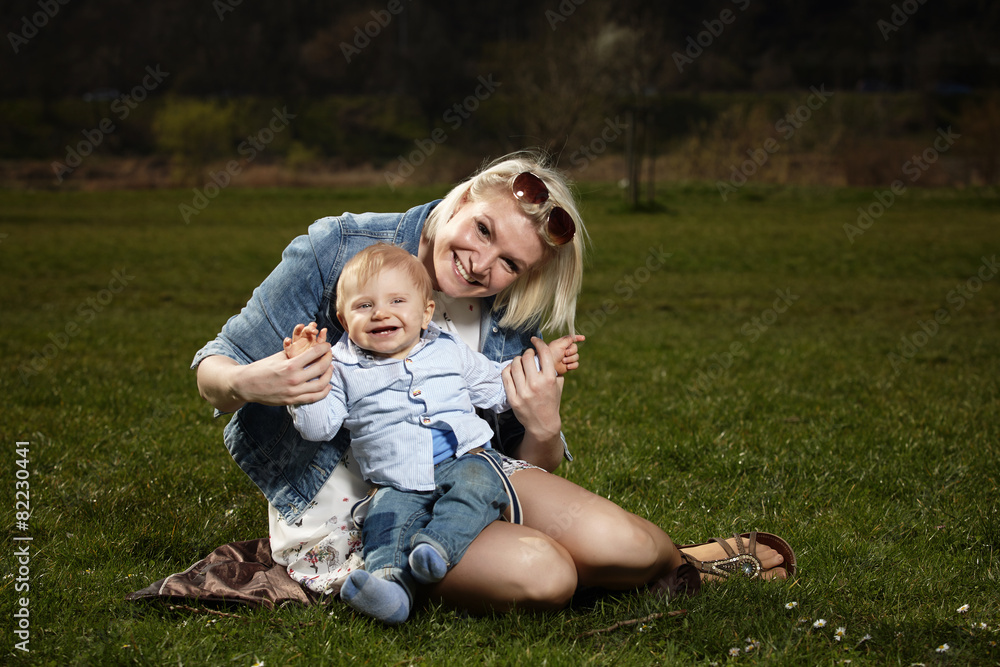 Mother and son on meadow Mother and son on meadow