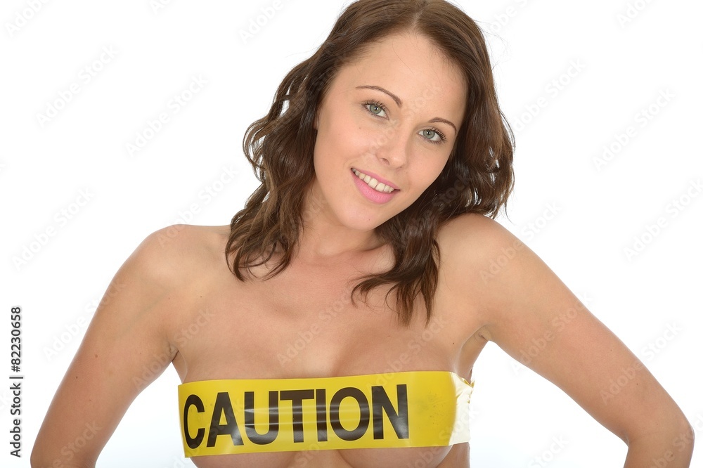 Fototapeta premium Sensual Naked Young Pin Up Woman Wearing Yellow Caution Tape