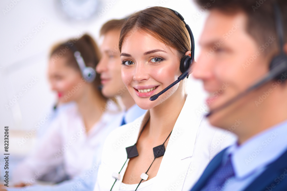 Attractive positive young businesspeople and colleagues in a Attractive positive young businesspeople and colleagues in a