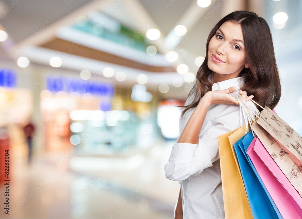 Shopping. Happy shopping woman with a group of friends at the Shopping. Happy shopping woman with a group of friends at the