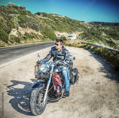 biker and motorcycle in hdr