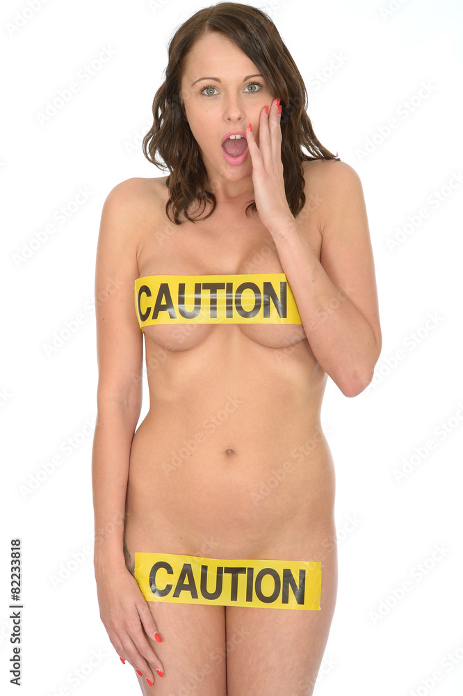 Naklejka premium Sexy Sensual Naked Young Pin Up Woman Wearing Yellow Caution Tap