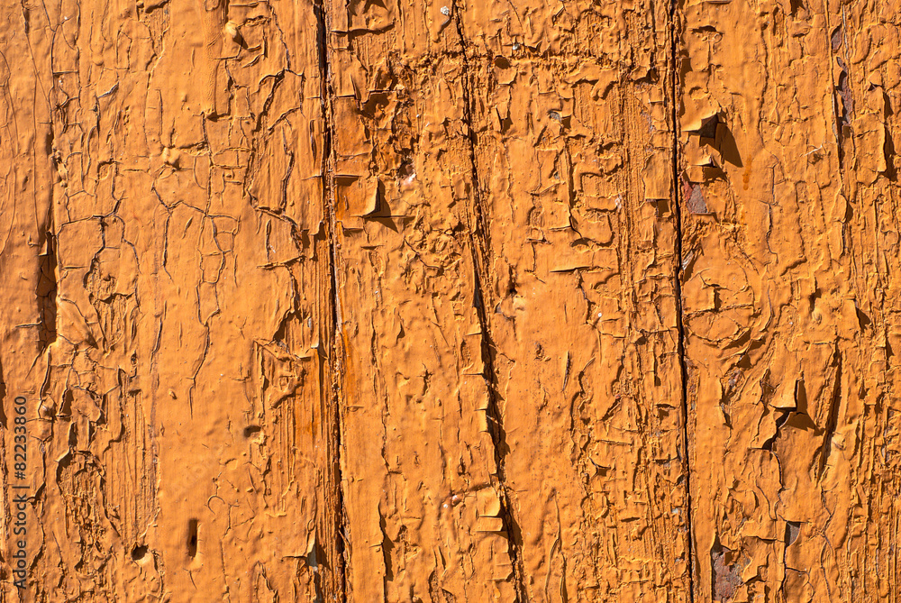 Fototapeta premium chipped paint on the wall of the old boards texture