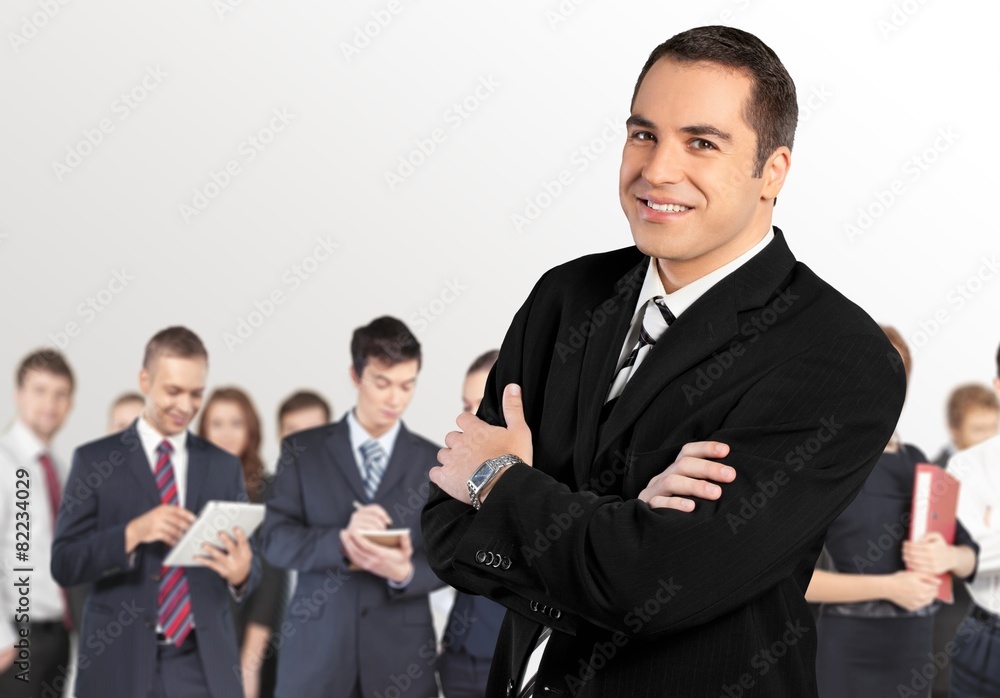 Businessman. Portrait of a businessman with arms crossed Businessman. Portrait of a businessman with arms crossed