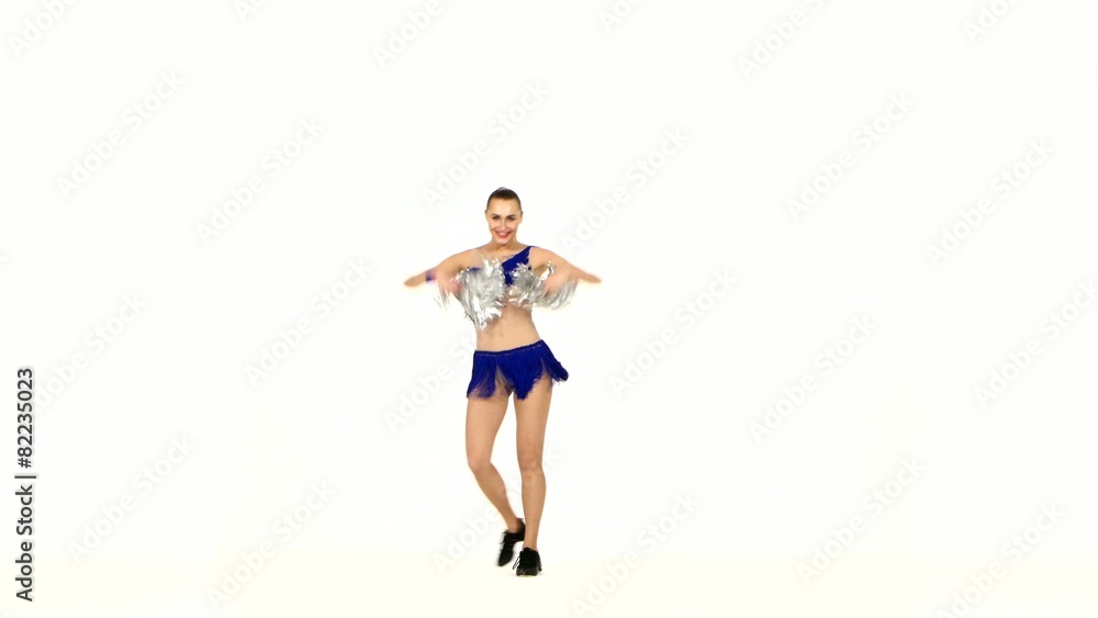Happy Smiling Cheerleader. Isolated On White Background. sits on Happy Smiling Cheerleader. Isolated On White Background. sits on