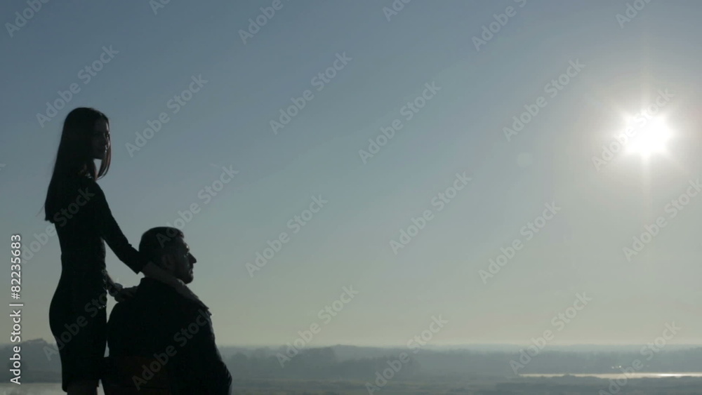 young girl comes to the guy in the morning on the terrace young girl comes to the guy in the morning on the terrace