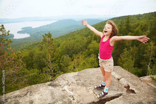 happy girl on the mountain top