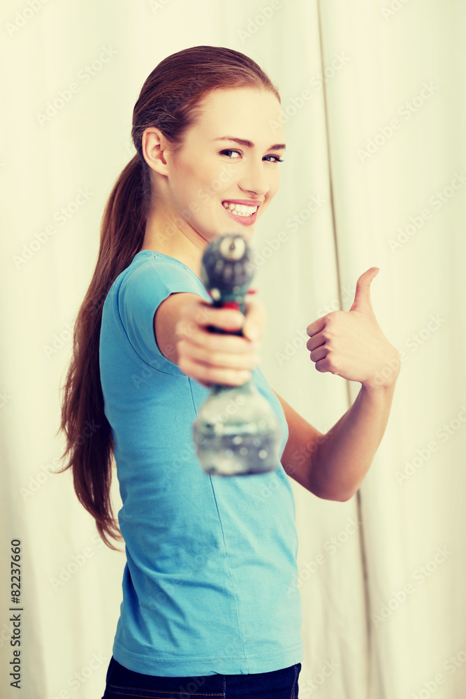 Woman with a power drill Woman with a power drill