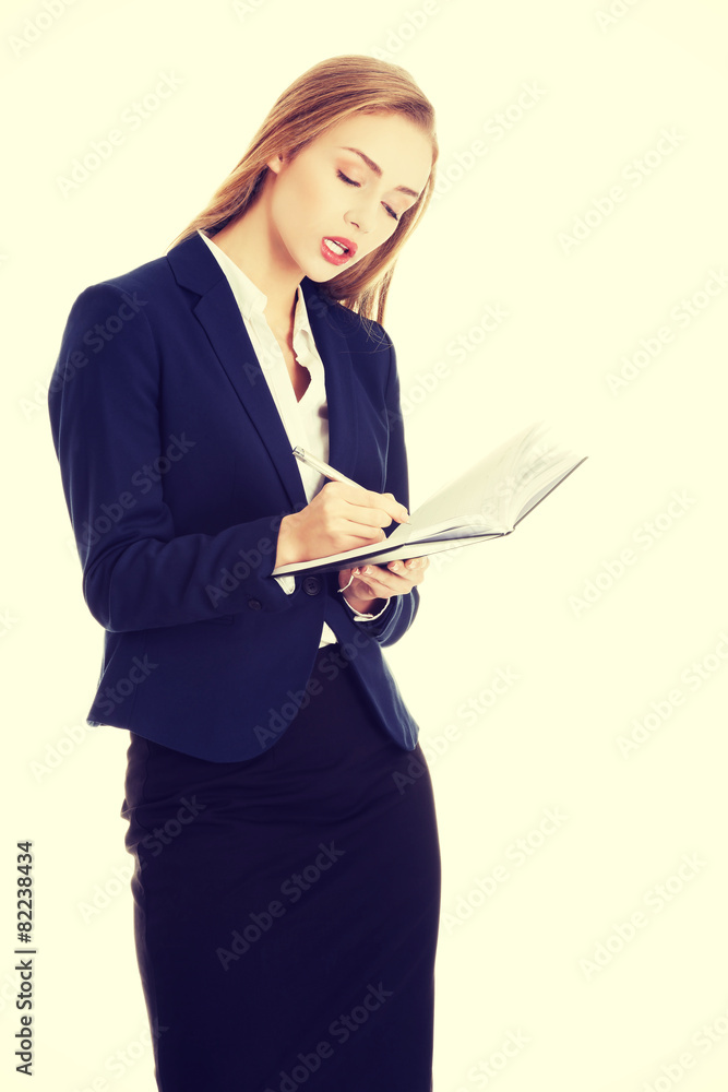 Businesswoman wondering about project Businesswoman wondering about project