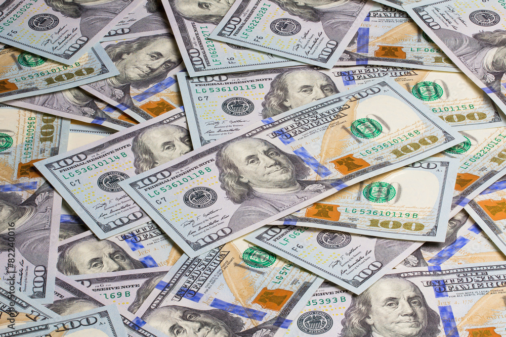 Many 100 dollars banknotes background Many 100 dollars banknotes background