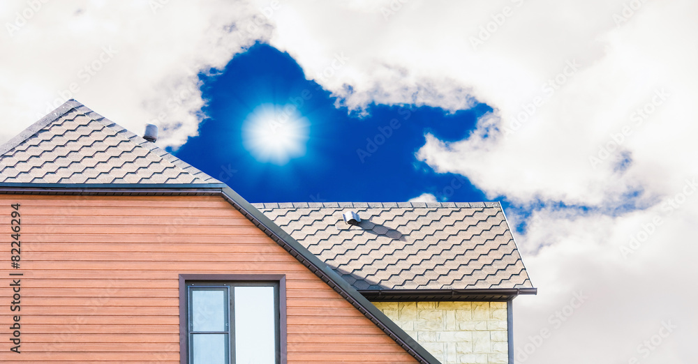 house with a gable roof window