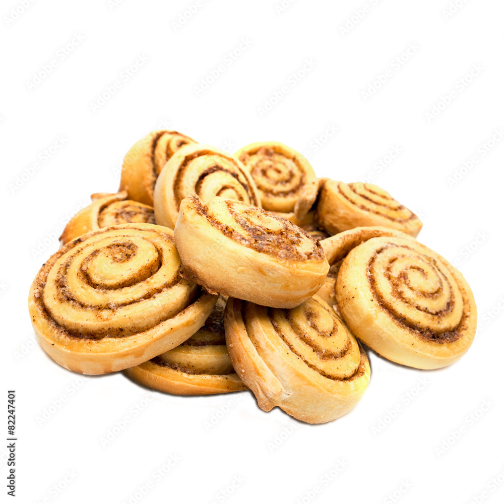 Sweet tasty cinnamon rolls isolated on white background