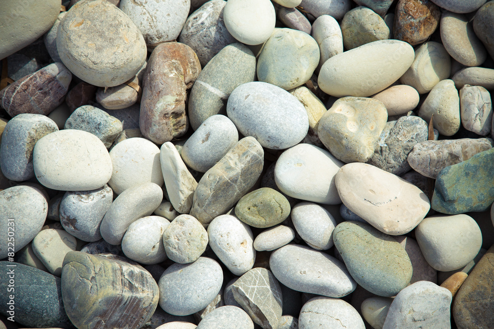 Different gray stones pebble beach. Toned Different gray stones pebble beach. Toned