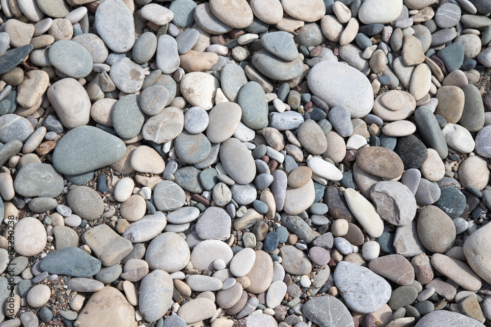 Different stones pebble beach. Selective focus Different stones pebble beach. Selective focus