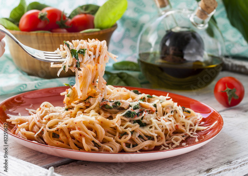 Pasta with fish and creamy spinach sauce
