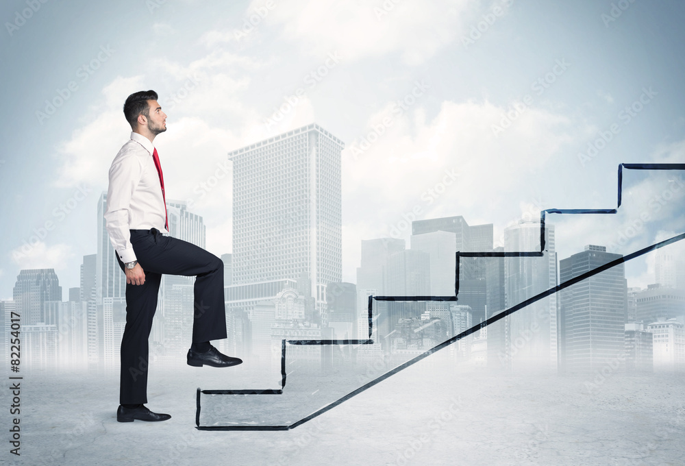 Business person in front of a staircase Business person in front of a staircase