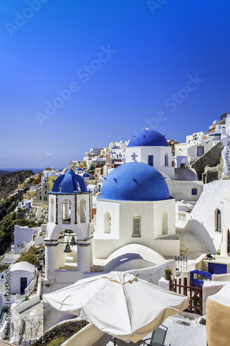 Santorini blue dome churches in Greece